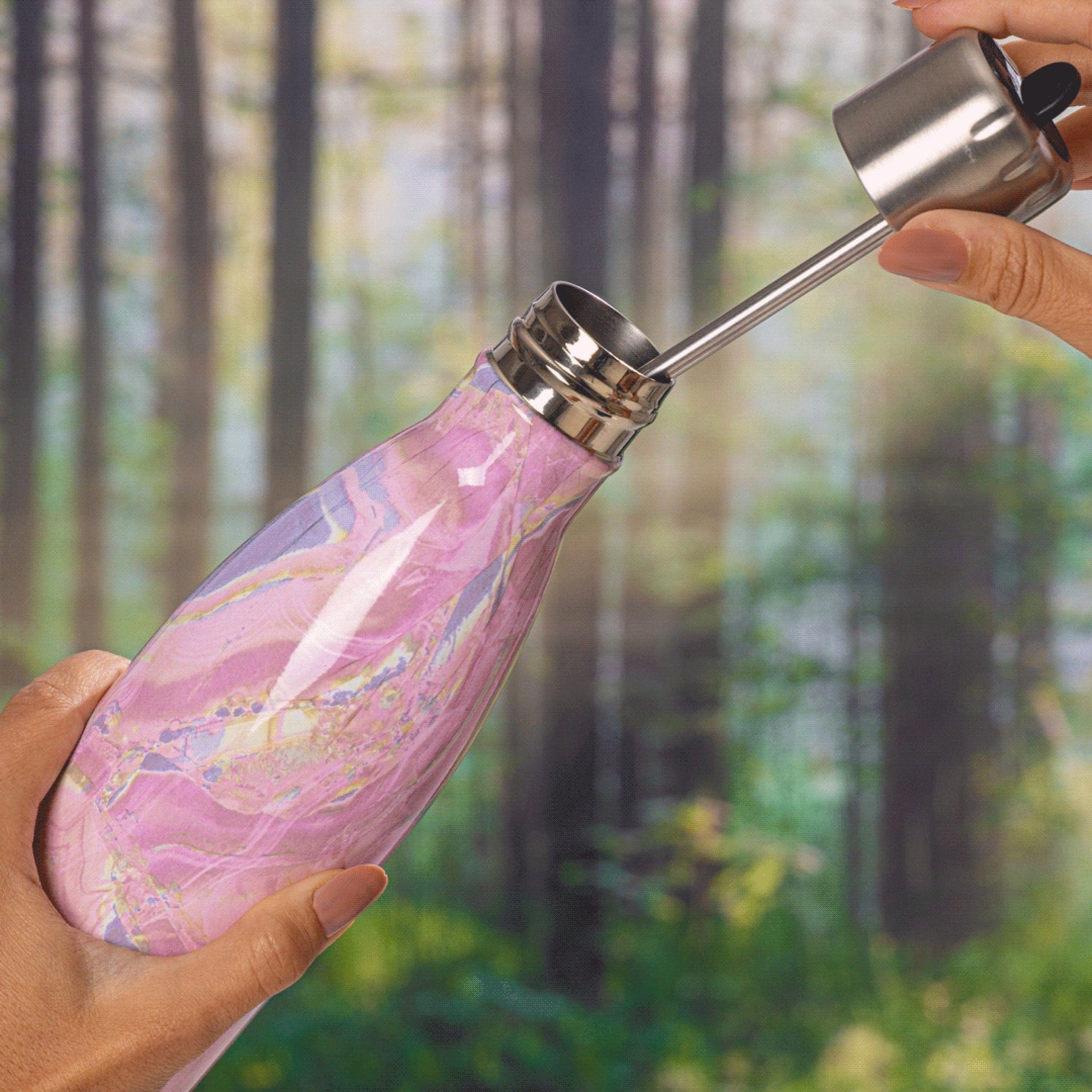 original-bottle-with-flip-straw-cap-17oz-g0 Swell-Water-Bottle-With-Straw-17oz-Pink-Geode-Rose-LifeStyle.jpg